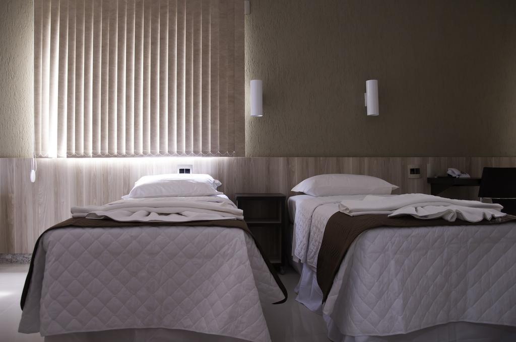 Hotel Domus Itabira Bagian luar foto