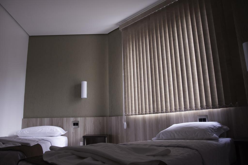 Hotel Domus Itabira Bagian luar foto